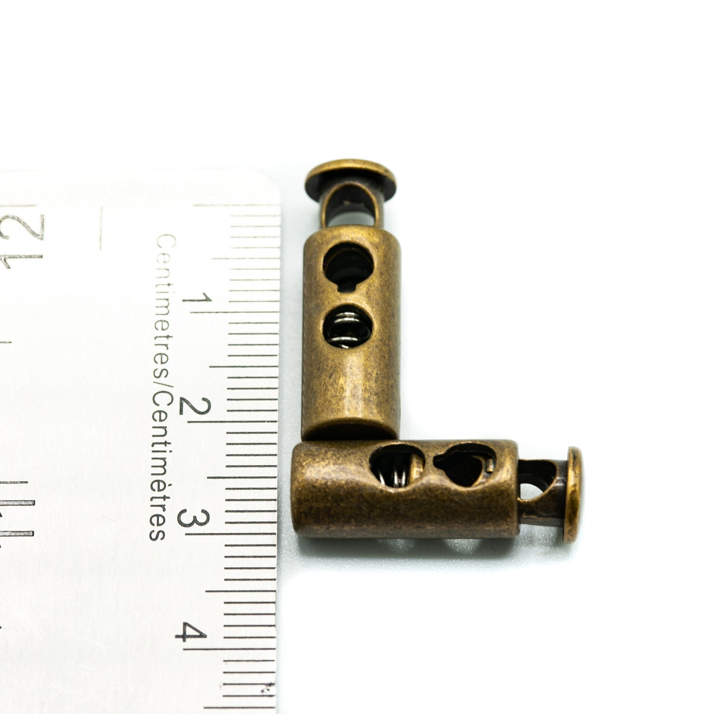 Cord Stoppers - Metal - Bronze (detail)