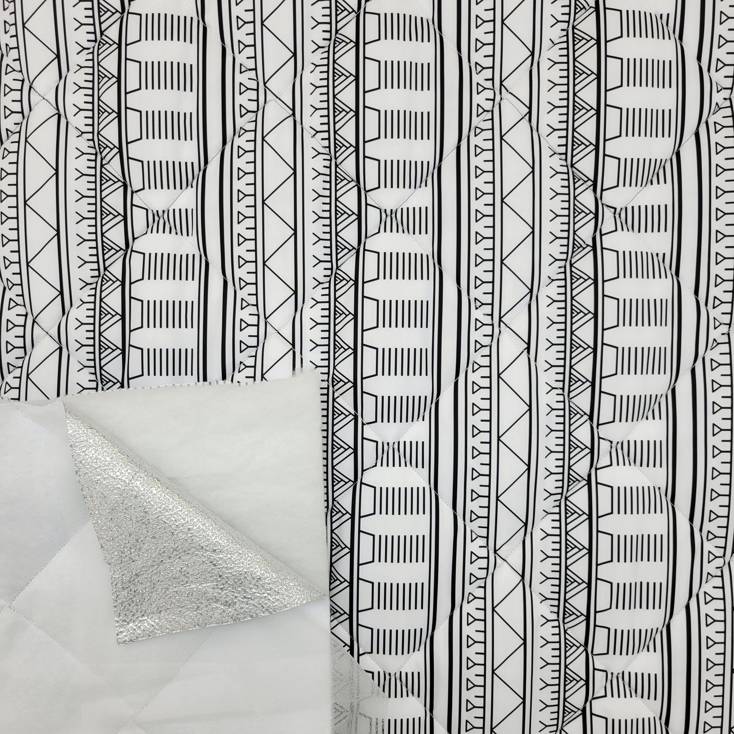 Quilted PrimaSoft™ /Radiantex 15oz Tunniit by Martha Kyak - White