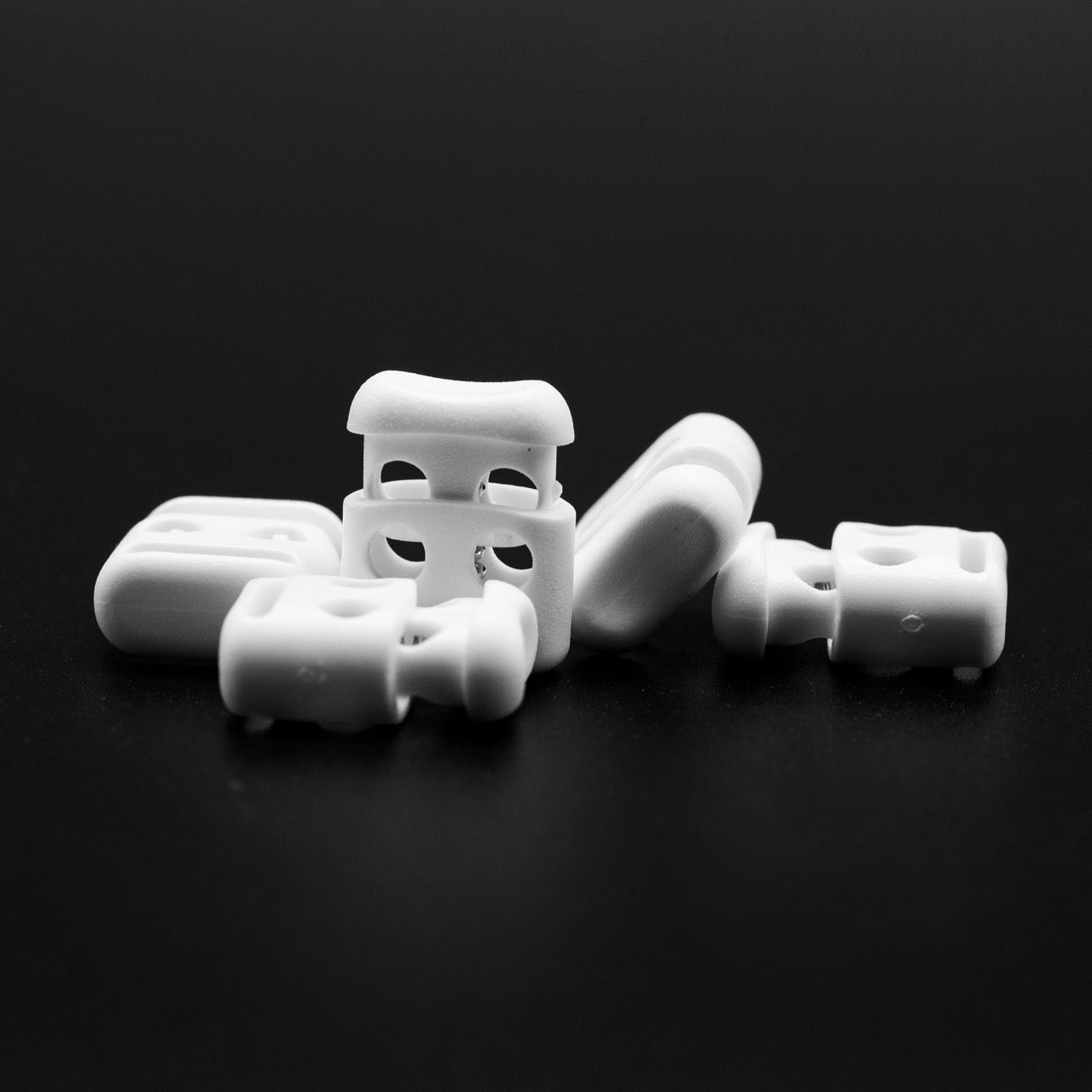 Cord Stoppers - Flat - White (group)