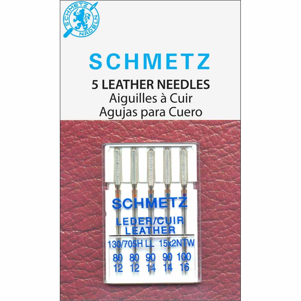Aiguilles en cuir sur carte