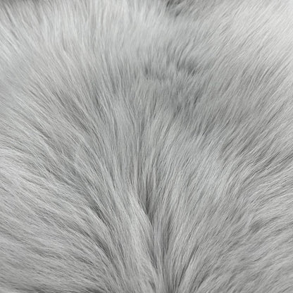 Close-up image of light grey dyed shadow fox fur.